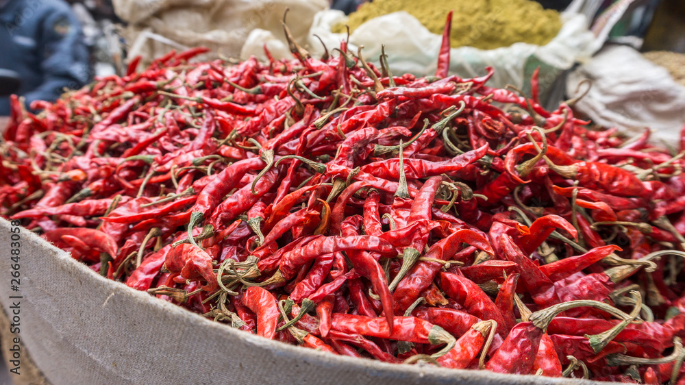 Fototapeta premium Closeup Dry red chili bag on the indian market