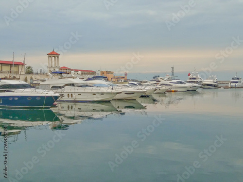 Yachts in the Sea port of Sochi on a cloudy day.