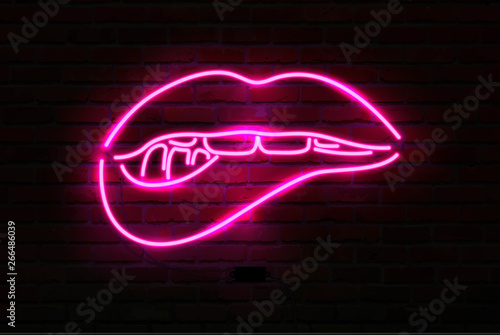 Pink neon luminous lips on brick wall. Vector illustration.