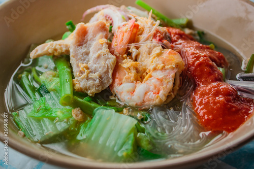 Suki in broth Mixed seafood with vermicelli and vegetables.