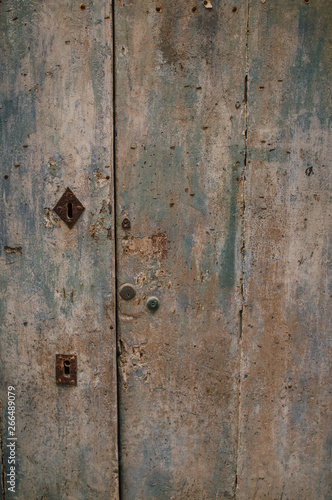 Old door with different paint, use as natural background