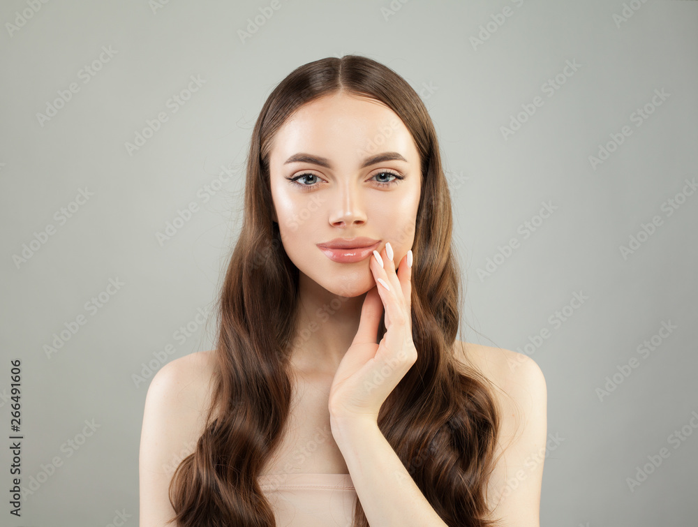 Cheerful woman with clear healthy skin. Pretty smiling spa model portrait Cheerful woman with clear healthy skin. Pretty smiling spa model portrait