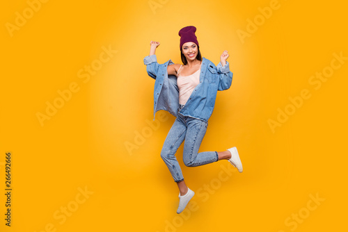 Full length body size view photo of charming attractive lady have spring mood raise hands arms fists good-looking summer feel glad candid isolated on colorful background wear modern summer clothes
