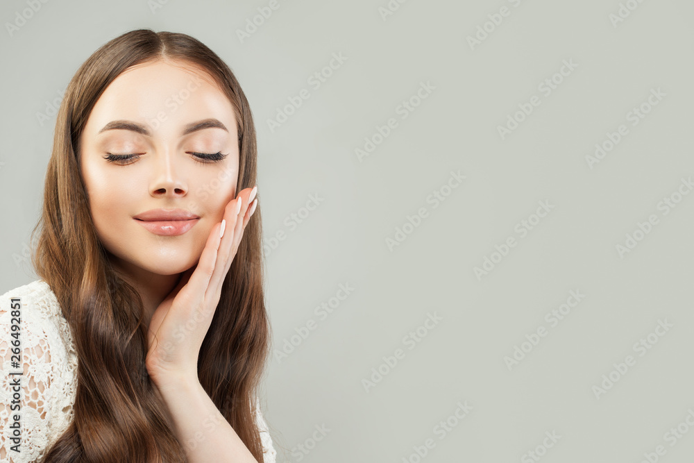 Young woman model with clear skin. Skincare and facial treatment concept Young woman model with clear skin. Skincare and facial treatment concept