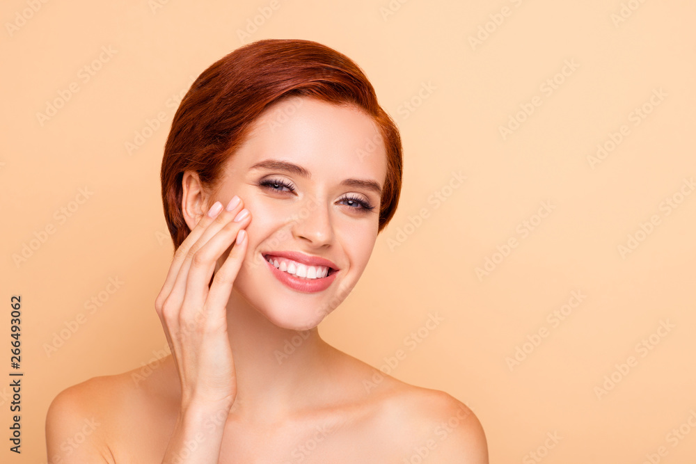 Close-up portrait of nice lovely cute attractive adorable sweet cheerful girl touching face healthy clean clear pure smooth fresh skin isolated over beige pastel background Close-up portrait of nice lovely cute attractive adorable sweet cheerful girl touching face healthy clean clear pure smooth fresh skin isolated over beige pastel background