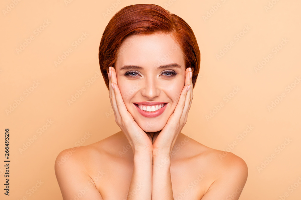 Close-up portrait of lovely sweet attractive cheerful positive cheery girl touching face healthy clean clear pure smooth fresh perfect flawless shine skin isolated over beige pastel background Close-up portrait of lovely sweet attractive cheerful positive cheery girl touching face healthy clean clear pure smooth fresh perfect flawless shine skin isolated over beige pastel background