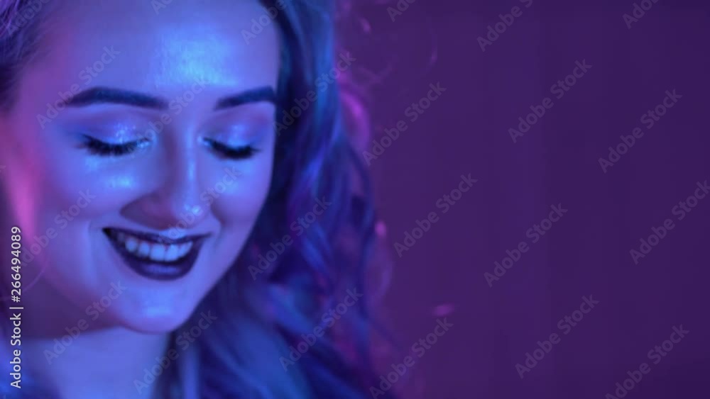 Young Blond Model is Posing in Neon Young Blond Model is Posing in Neon