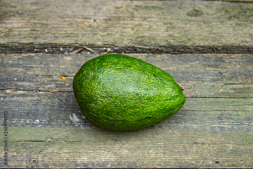 juicy ripe avocado on wooden 