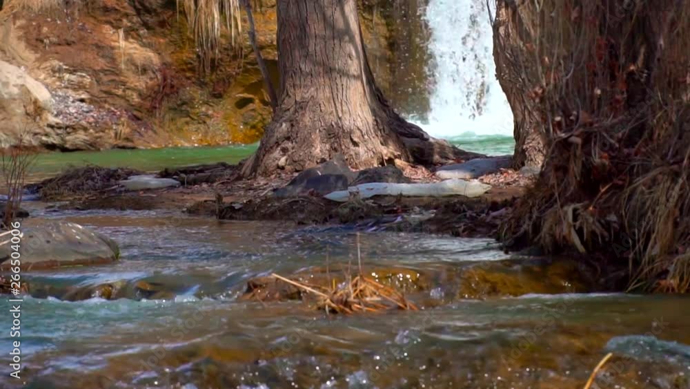 Scenic view of powerful waterfall and river in the beautiful nature, slow motion. Scenic view of powerful waterfall and river in the beautiful nature, slow motion.