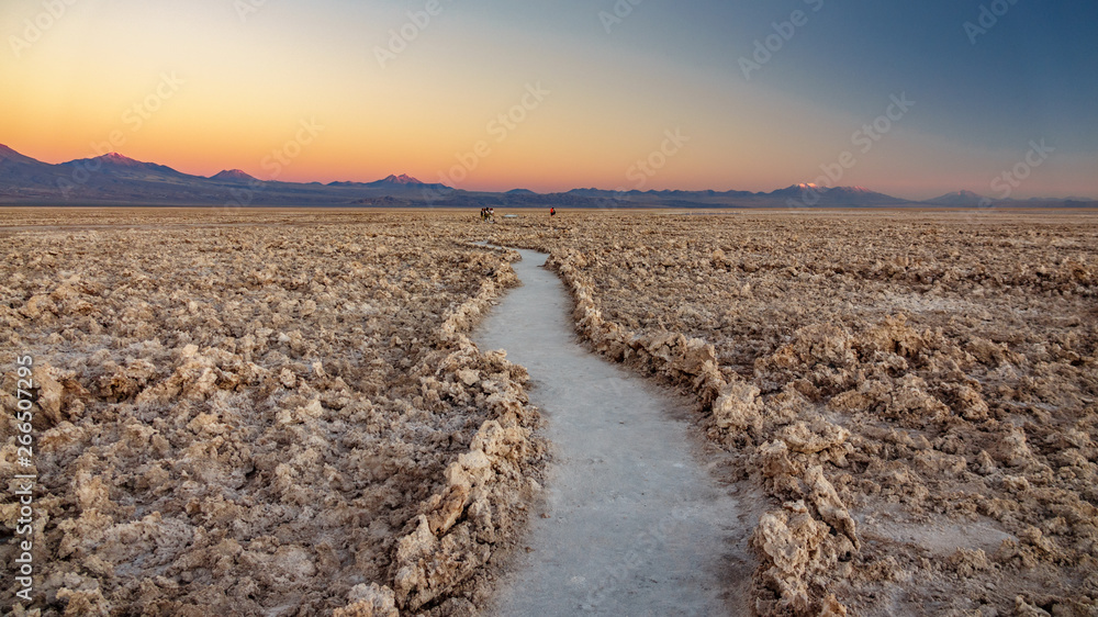 Salt flat of Atacama track in Chile at dusk