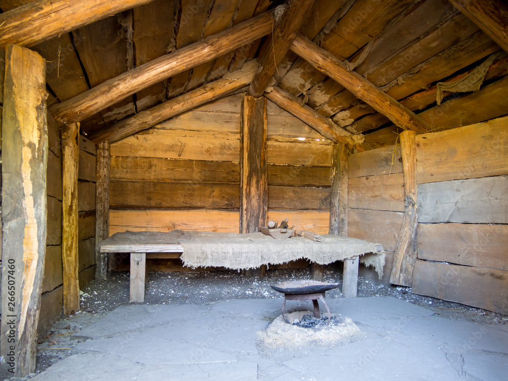 Interior of an old hut with a gable roof