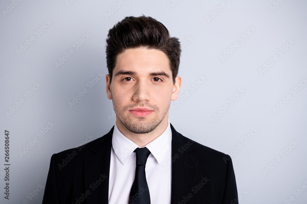 Close up photo amazing he him his macho attractive handsome look watch interested curious wondered not smiling wear white shirt black suit jacket tie formalwear isolated bright grey background Close up photo amazing he him his macho attractive handsome look watch interested curious wondered not smiling wear white shirt black suit jacket tie formalwear isolated bright grey background