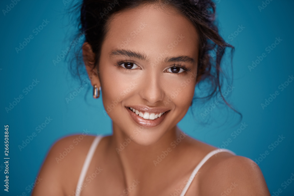 Cute girl at blue background Cute girl at blue background