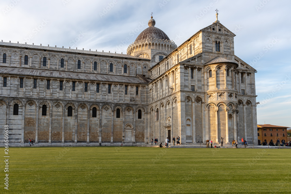 PISA, TUSCANY/ITALY  - APRIL 18 : Exterior view of the Cathedral in Pisa Tuscany Italy on April 18, 2019. unidentified people