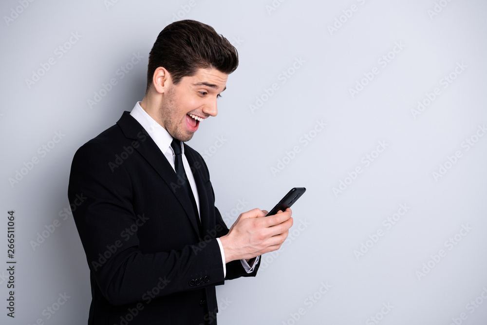 Profile side photo cheerful funny representative social media marketing worker use user apps gadgets communication impressed unexpected incredible notification scream outfit isolated grey background Profile side photo cheerful funny representative social media marketing worker use user apps gadgets communication impressed unexpected incredible notification scream outfit isolated grey background