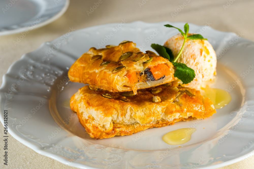 cake with poppy seeds served with ice cream