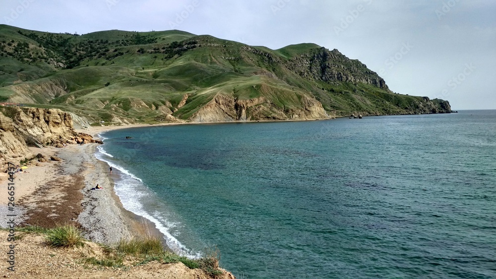 sea ​​coast and green cape