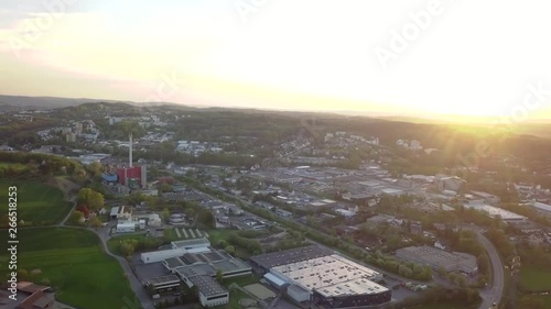 AERIAL, beautiful view of a small city at sunrise