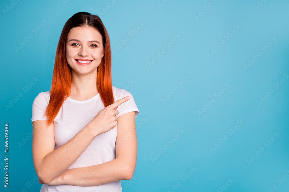 Portrait of her she nice attractive lovely winsome confident cheerful cheery girl wearing white t-shirt pointing aside ad copy space isolated over bright vivid shine blue background Portrait of her she nice attractive lovely winsome confident cheerful cheery girl wearing white t-shirt pointing aside ad copy space isolated over bright vivid shine blue background