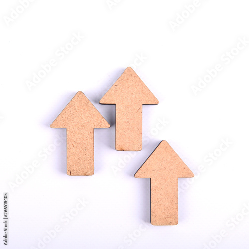  Wooden arrows in different directions are isolated on a white background