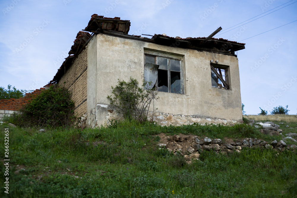 A ruined hut on a hill A ruined hut on a hill