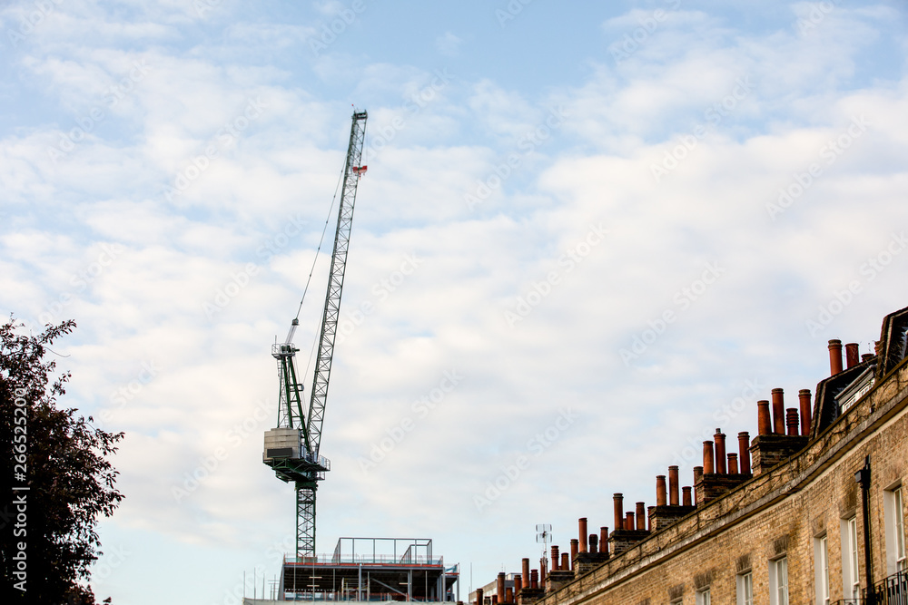 Construction crane. Construction site, high-rise construction