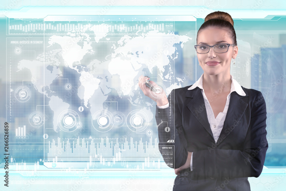 Young business lady works with virtual graphic interface in futuristic office Young business lady works with virtual graphic interface in futuristic office