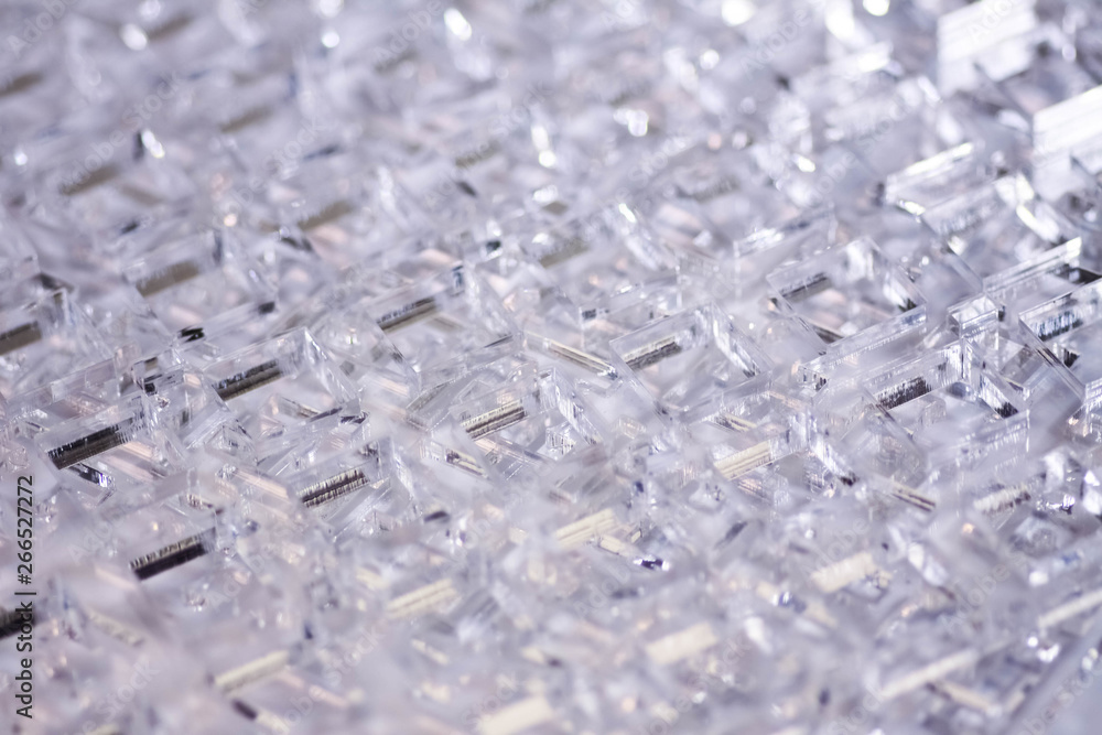 Abstract high-tech geometrical background. Details of transparent plastic or glass. Laser cutting of plexiglass or 3d printing. Abstract high-tech geometrical background. Details of transparent plastic or glass. Laser cutting of plexiglass or 3d printing.