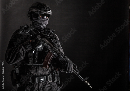Elite police squad member in tactical ammunition