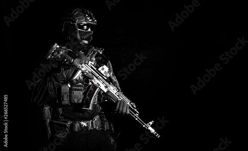 Equipped elite forces soldier low key portrait
