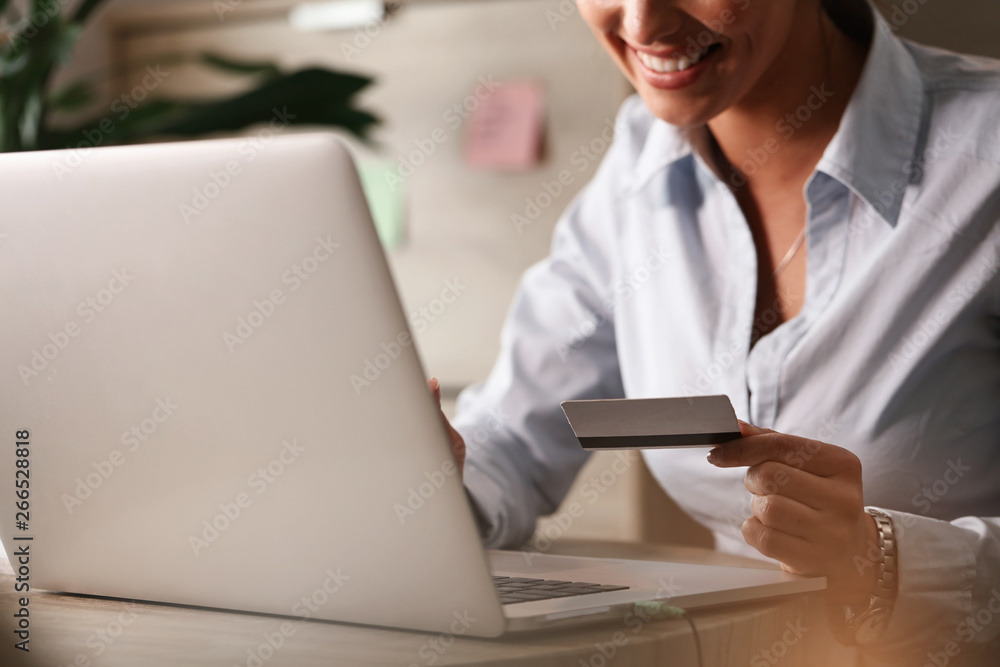 Online banking with laptop and credit card!