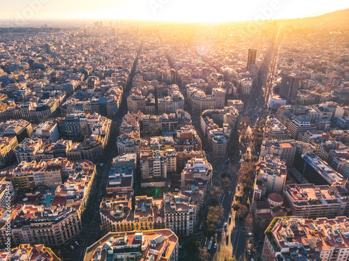Aerial view of Barcelona Eixample residencial district, Sagrada familia, typical urban squares, Spain.2019
