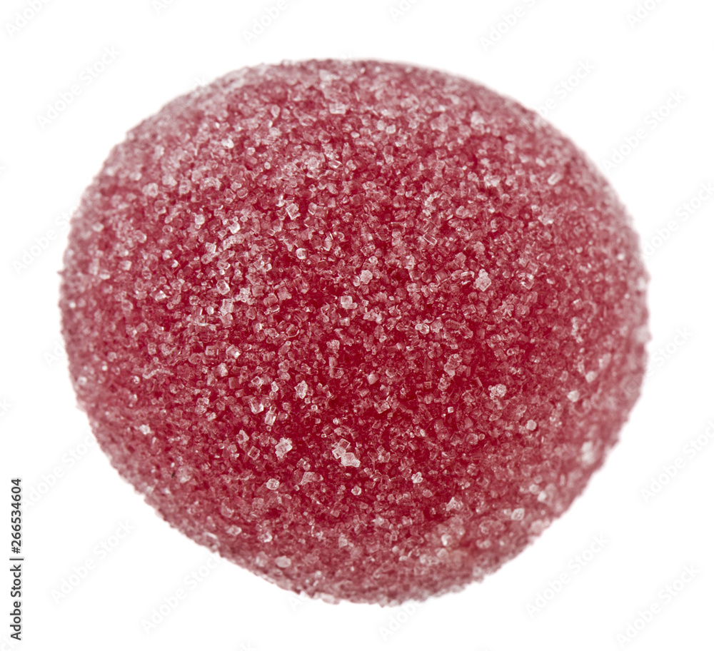Red marmalade ball in sugar isolated on white background close up Red marmalade ball in sugar isolated on white background close up