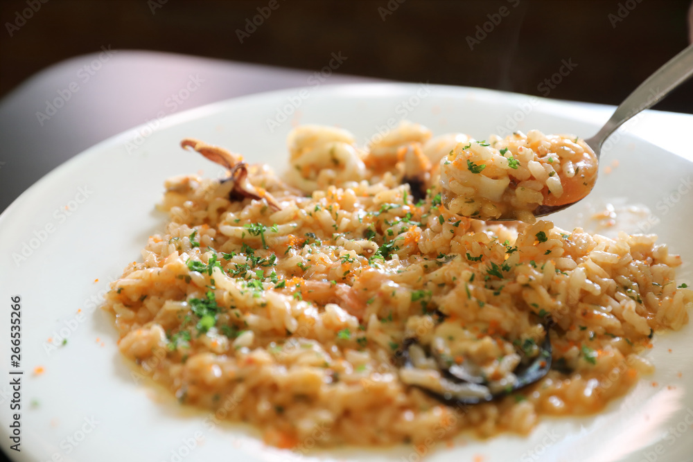 Seafood Risotto , traditional italian rice on table Seafood Risotto , traditional italian rice on table