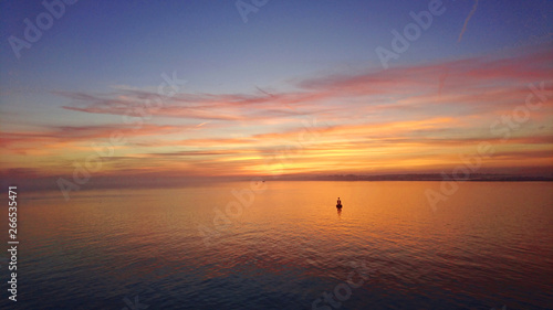 Fototapeta Naklejka Na Ścianę i Meble -  Sunset over the sea in the Solent