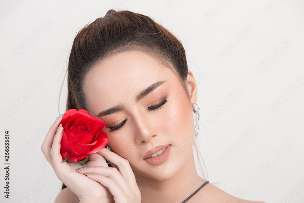 Beautiful woman face. Hand of make-up Beautiful woman face. Hand of make-up