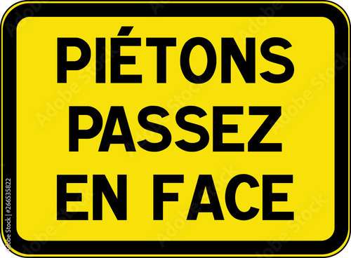 Panneau de chantier : piétons passez en face
