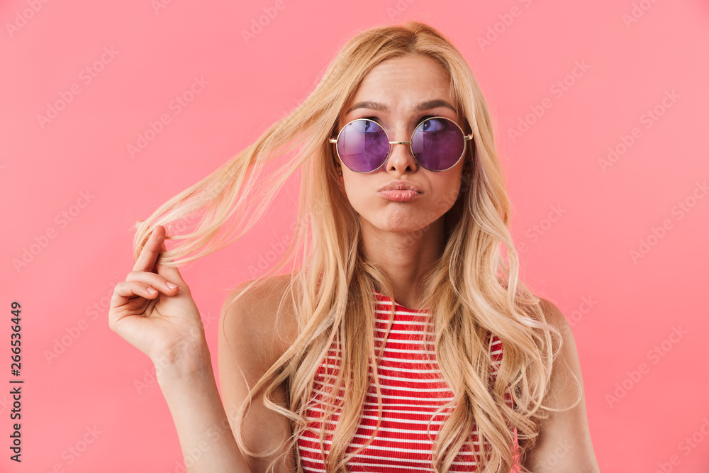 Portrait of a confused blonde woman Portrait of a confused blonde woman