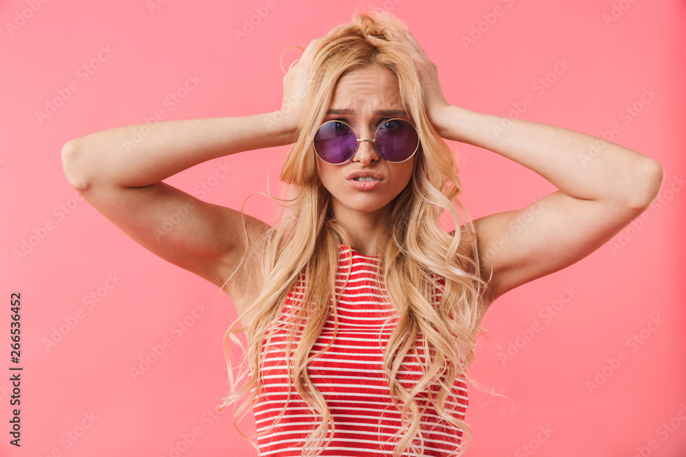 Portrait of a confused blonde woman Portrait of a confused blonde woman