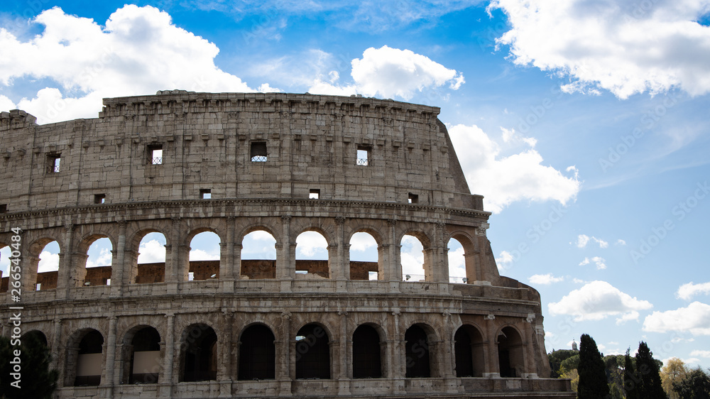 Panoramic view of Colosseum in Rome, Italy as clouds in Rome architecture and landmark. Rome Colosseum is one of the main attractions of Rome in Italy