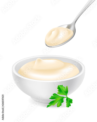 Mayonnaise in a bowl and spoon