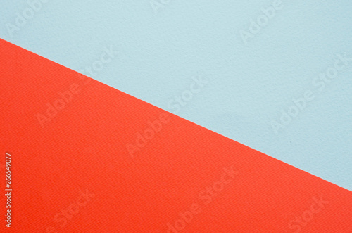 Minimalistic paper background in green and orange.