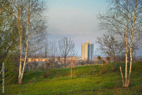 Urbanization against nature. Poor urban development leading to imminent elimination of green areas. Ukraine. photo