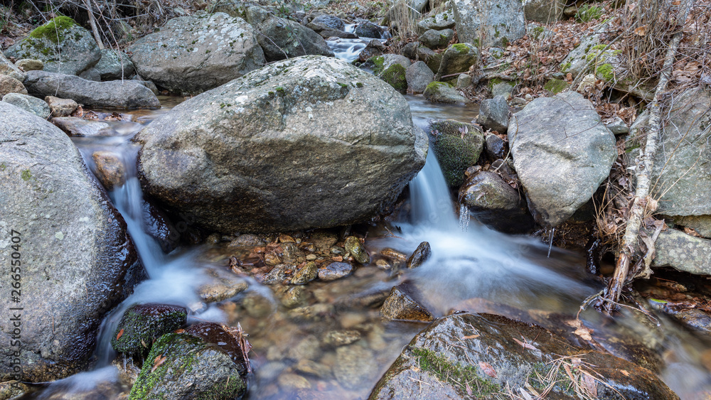small waterfall in a river near madrid