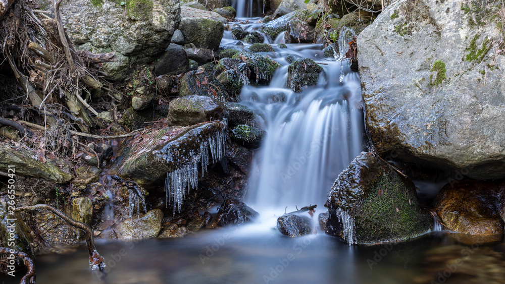small waterfall in a river near madrid