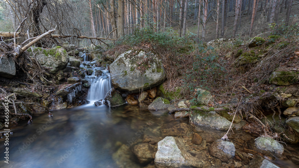 small waterfall in a river near madrid