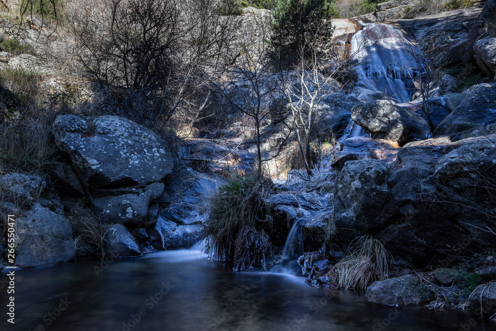 small waterfall in a river near madrid