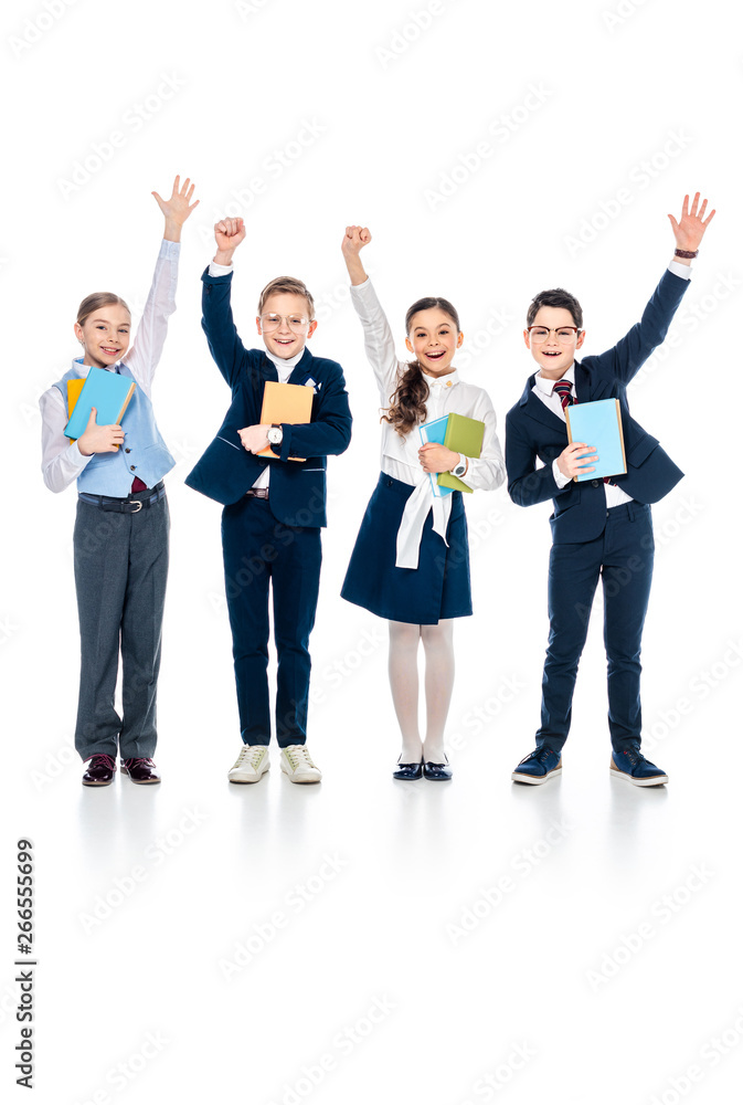 happy schoolchildren with outstretched hands holding books On White
