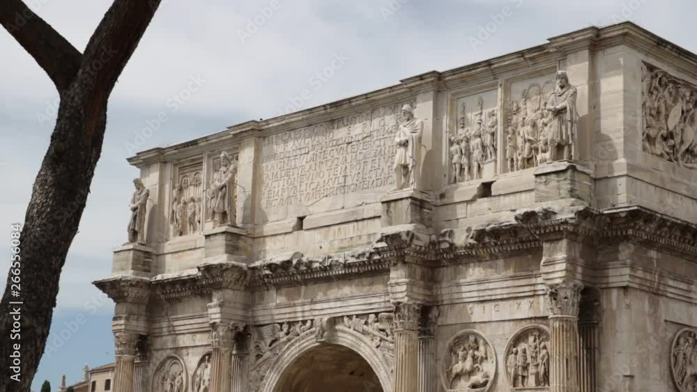Arch of Constantine near the Colosseum. Rome. Detail of relief sculptures of the Constantine arch covered in white marble. Arch of Constantine near the Colosseum. Rome. Detail of relief sculptures of the Constantine arch covered in white marble.