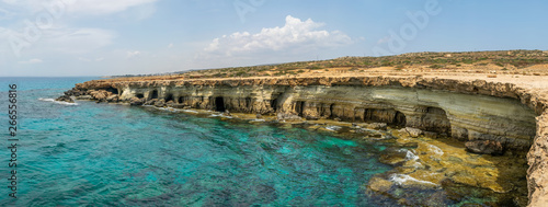 Picturesque sea caves are located on the Mediterranean coast.